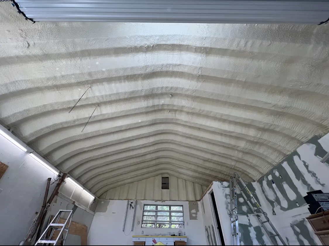Spray polyurethane foam applied to the underside of a metal roof deck in Rolling Meadows